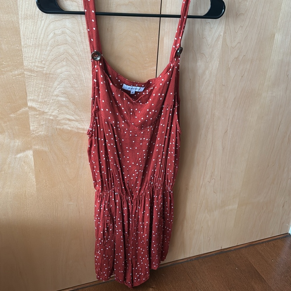 Orange polka dot romper